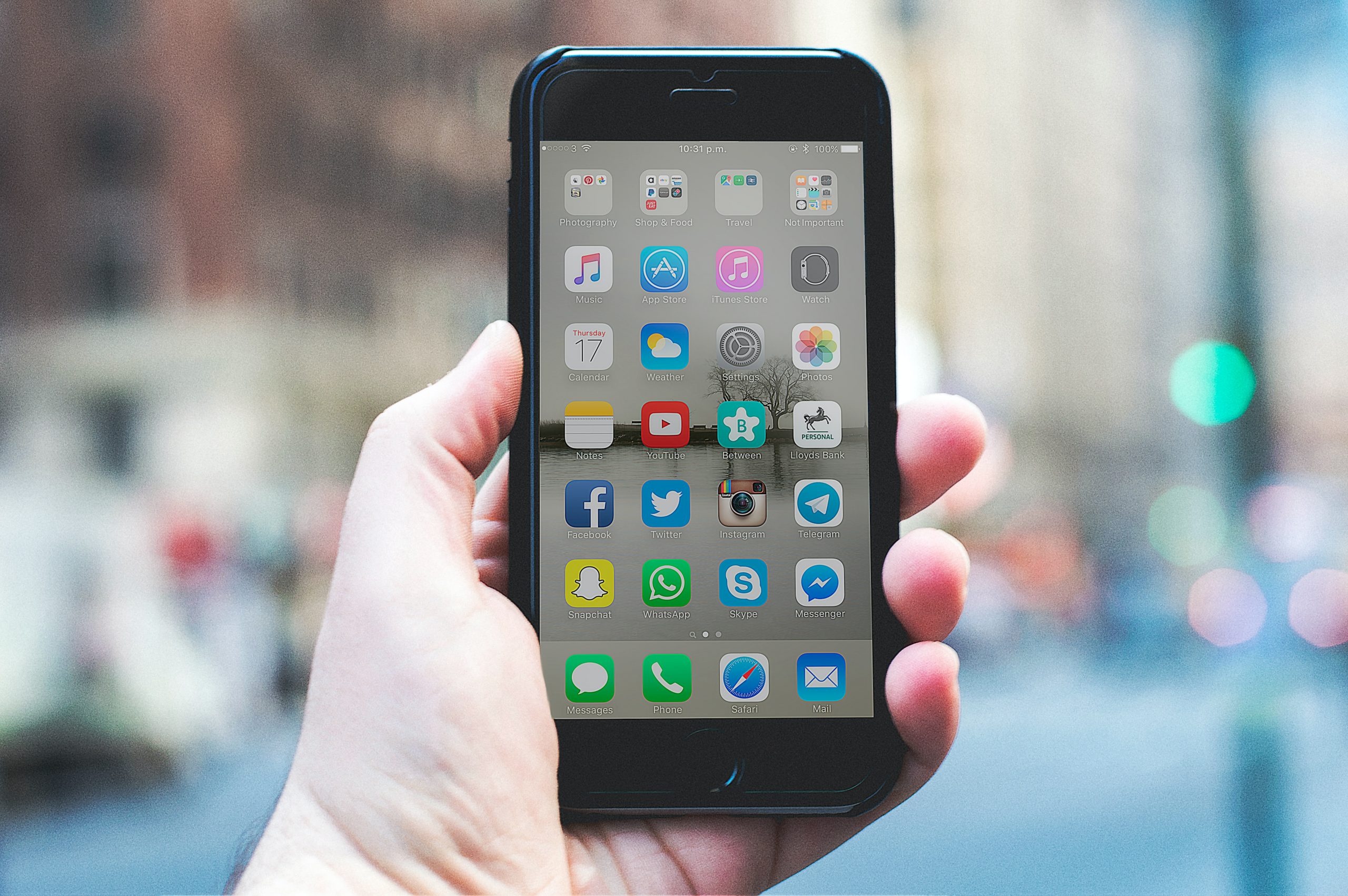 mobile app icons on the main menu of an iphone